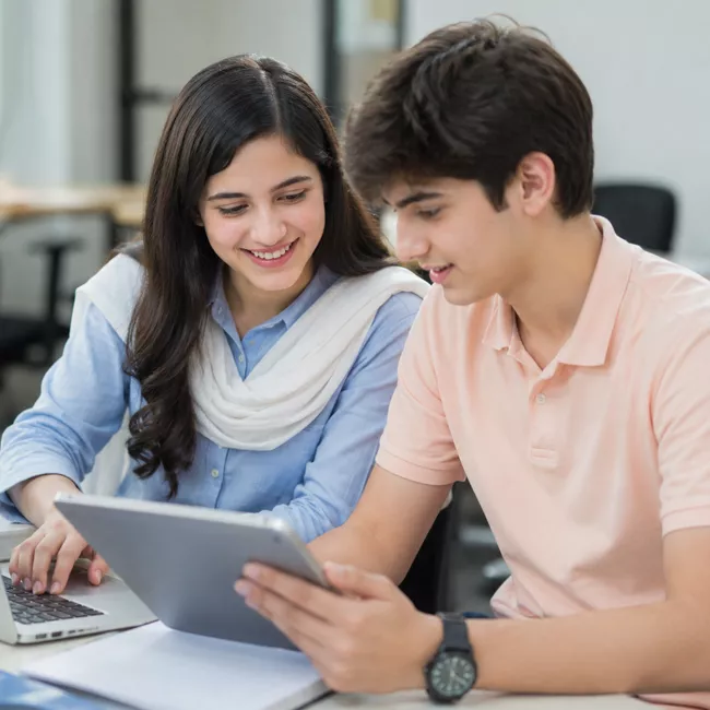 Students working in a computer lab at SuperTech
